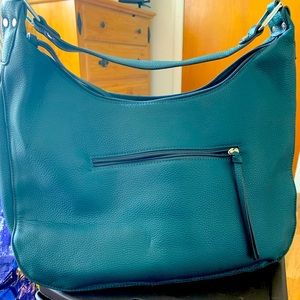 Regular Duffel bag..worn twice, with numerous space on the inside. Large